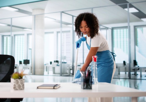 A woman from Pro Kleen, a commercial cleaning company in Central Illinois, cleans a business office as part of Pro Kleen's reliable commercial cleaning services