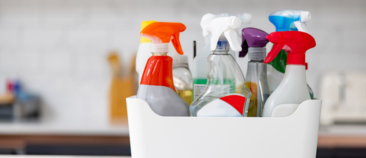 Box with cleaning products on the kitchen counter of an apartment shows how Pro Kleen offers property management cleaning